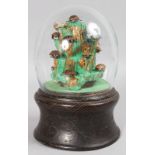 AN UNUSUAL VICTORIAN "TREMBLER" TURTLE GLASS DOMED ORNAMENT on a painted wooden base. 10ins high.