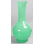 A GREEN PEKING GLASS VASE. 12ins high.