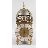 A BRASS LANTERN CLOCK by GILES LUMBARD, ILMINSTER. 14ins high.