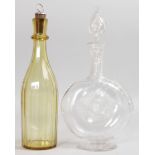 AN AMBER TALL DECANTER AND STOPPER and A LIQUEUR DECANTER AND STOPPER.