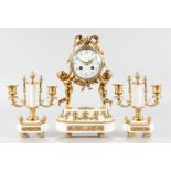 A SMALL LOUIS XVI DESIGN WHITE MARBLE AND GILT METAL THREE PIECE CLOCK GARNITURE, the clock with