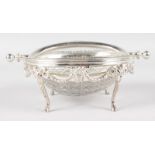 A SMALL ADAMS DESIGN CUT GLASS AND PLATE BUTTER TUREEN with swivel top. 9ins wide.