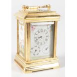 A MULTI DIAL SEVRES BRASS CARRIAGE CLOCK. 3ins high.