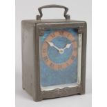 A TUDRIC PEWTER LIBERTY & CO CARRIAGE CLOCK by ARCHIBALD KNOX, Numbered 0721, CIRCA. 1903, with