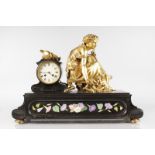 A SUPERB 19TH CENTURY FRENCH GILT BRONZE AND BLACK MARBLE CLOCK, with circular drum movement