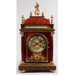 A MAPLE & CO LOUIS XVI DESIGN TORTOISESHELL AND ORMOLU MANTLE CLOCK, the face with blue and white