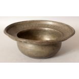 A 19TH/20TH CENTURY PERSIAN SILVERED COPPER BOWL, with a wide rim, 9.5in diameter & 3.6in high.