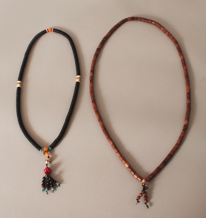 TWO CHINESE BEAD NECKLACES. (2)