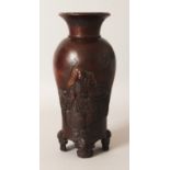 A GOOD QUALITY EARLY 20TH CENTURY JAPANESE BRONZED METAL VASE, decorated with two samurai, one of