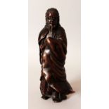 A GOOD QUALITY JAPANESE MEIJI PERIOD BRONZE MODEL OF A SAGE, standing with his robes held around