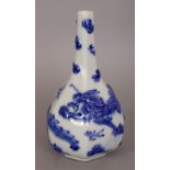 A 20TH CENTURY ORIENTAL MOULDED BLUE & WHITE PORCELAIN DRAGON VASE, 7.7in high.