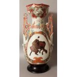 A LARGE JAPANESE HICHOZAN SHIMPO LACQUERED PORCELAIN VASE, decorated with a panel of a sage on a