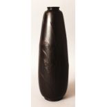 A SIGNED JAPANESE MEIJI PERIOD BRONZE VASE, the sides cast in relief with wind blown grasses, the