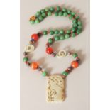 A GOOD QUALITY 20TH CENTURY CHINESE JADE PENDANT, with a fine quality jade, hardstone, and coral