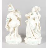 A LARGE PAIR OF VICTORIAN WHITE PORCELAIN FIGURES OF A GALLANT AND LADY in Elizabethan dress.