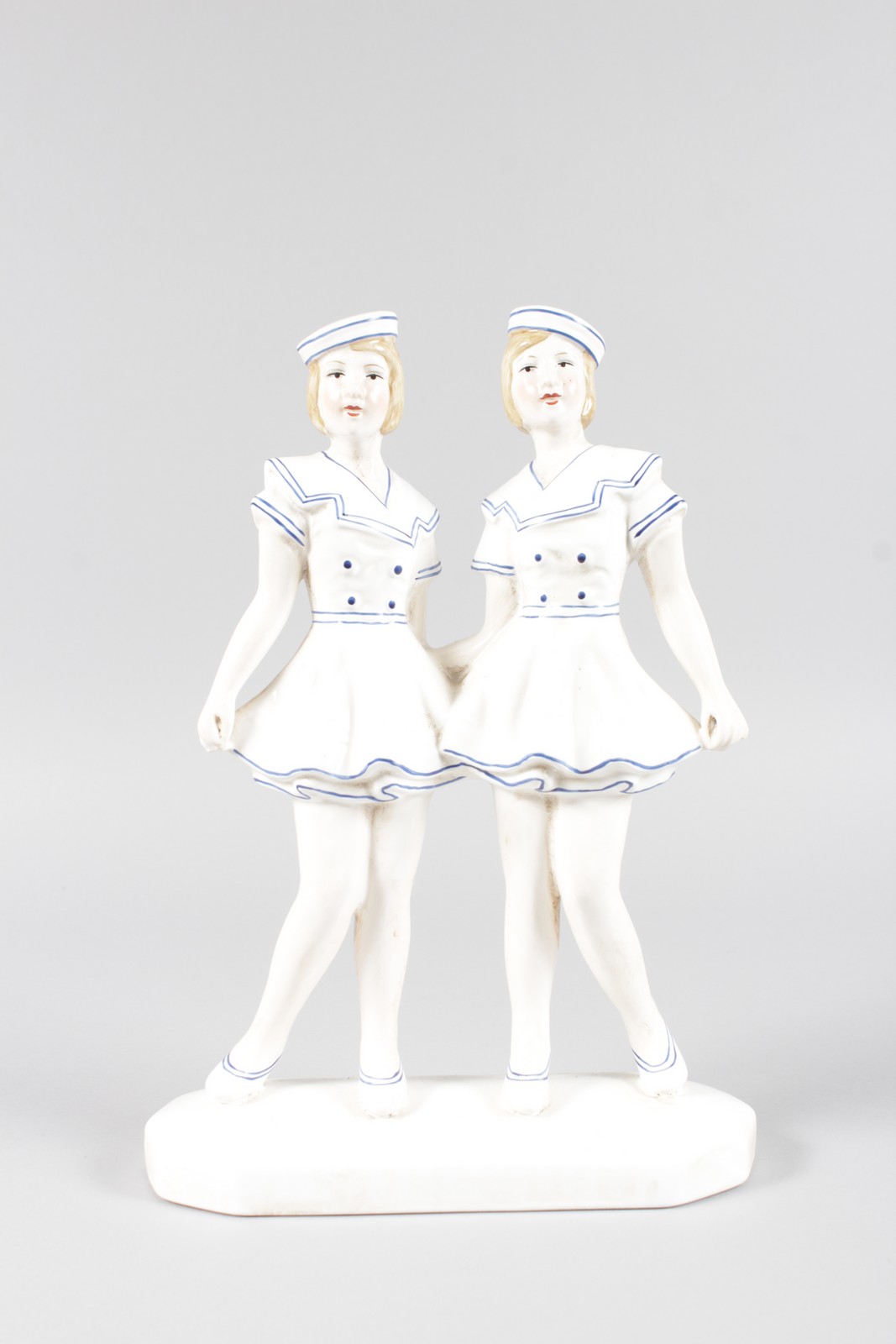 AN ART DECO DESIGN BLUE AND WHITE GROUP OF TWO GIRLS. 12ins high. - Image 2 of 2