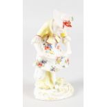 AN 18TH CENTURY RARE BOW FIGURE OF A GIRL FEEDING CHICKS, after a Meissen figure by Kaendler. 5ins