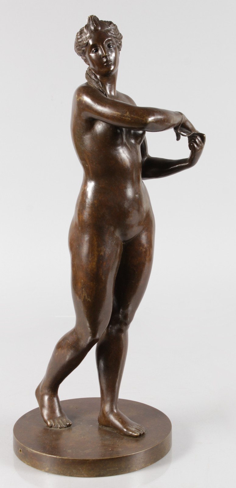 MAYA SERGER VAN PANHUYS A BRONZE STANDING FEMALE NUDE on a circular base. Signed and dated 1925.