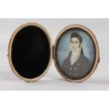 EARLY VICTORIAN SCHOOL Portrait miniature of a young gentleman in a dark coat and white cravat.