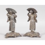 A SMALL PAIR OF WMFB METAL FIGURES OF JAPANESE DANCERS holding fans, stamped WMFB 1/02/0. 4.5ins