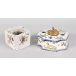 A FRENCH FAIENCE SQUARE INKWELL, 3ins, and ANOTHER SHAPED, 4.5ins (2).