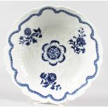 AN 18TH CENTURY WORCESTER JUNKET DISH with rare bamboo moulding decorated with underglaze blue