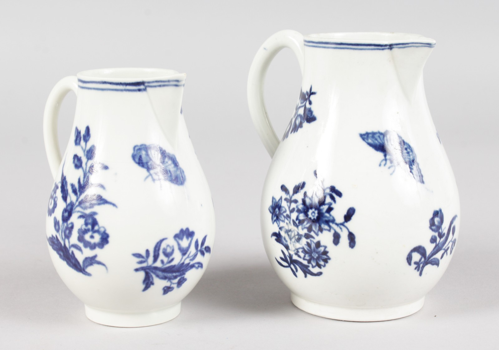 AN 18TH CENTURY WORCESTER SPARROW BEAK JUG, printed with the Three Flowers pattern in underglaze