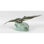 A GOOD LARGE ART DECO BRONZE SEAGULL, wings outstretched, on a large crystal rock. 24ins long, 11ins