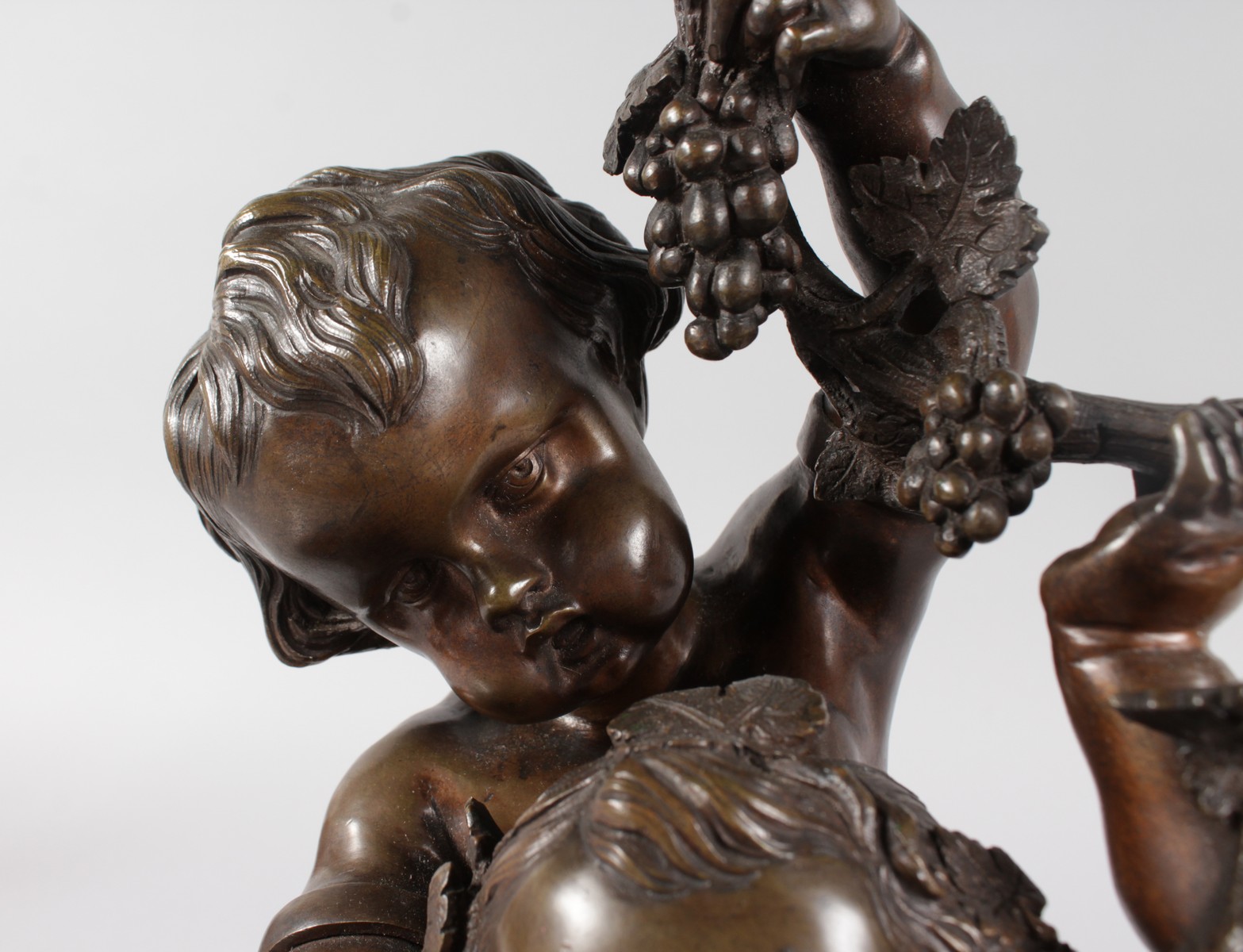 A GOOD 19TH CENTURY FRENCH BRONZE GROUP OF TWO YOUNG CUPIDS depicting harvest, holding grapes. 15ins - Image 6 of 9