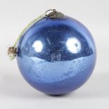 A BLUE WITCHES BALL.