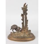 A 19TH CENTURY BRONZE THERMOMETER with a stork and frog on an oval base. 5.5ins high.