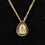 A 14CT GOLD AND YELLOW DIAMOND PENDANT on chain.