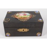 A 19TH CENTURY FRENCH WOODEN JEWELLERY BOX with porcelain panels. 7ins wide.