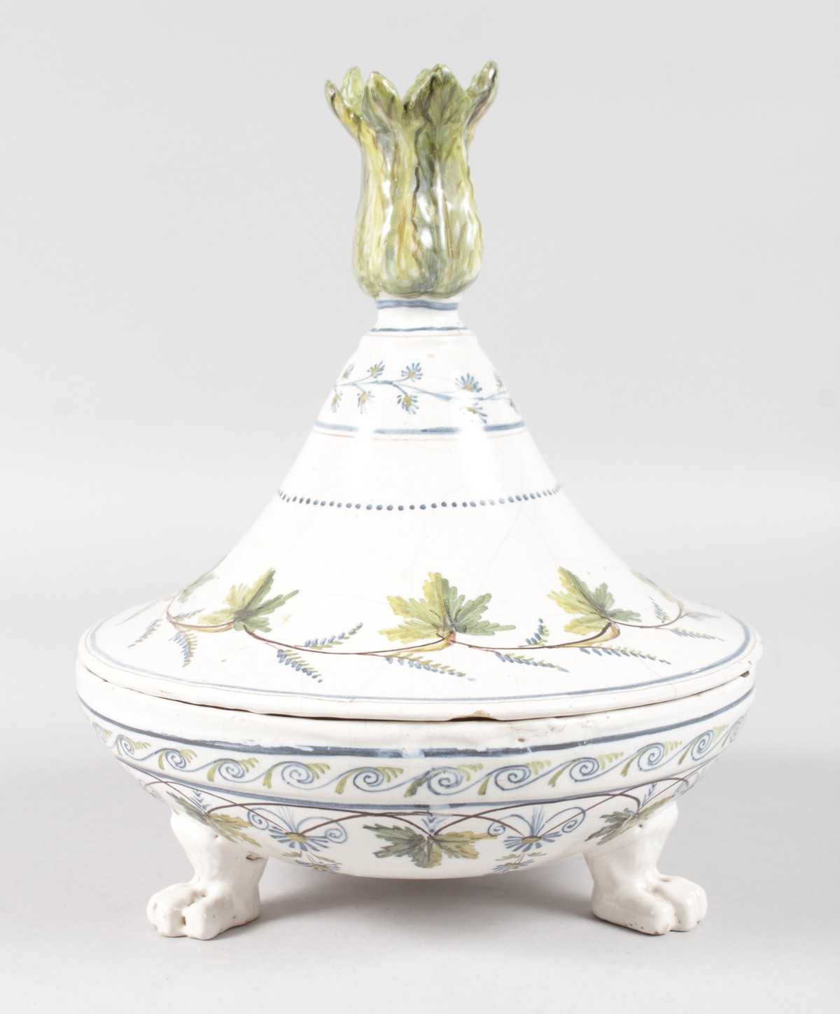 AN UNUSUAL 19TH CENTURY FAIENCE CIRCULAR INKWELL AND COVER with flared lift off lid with candle