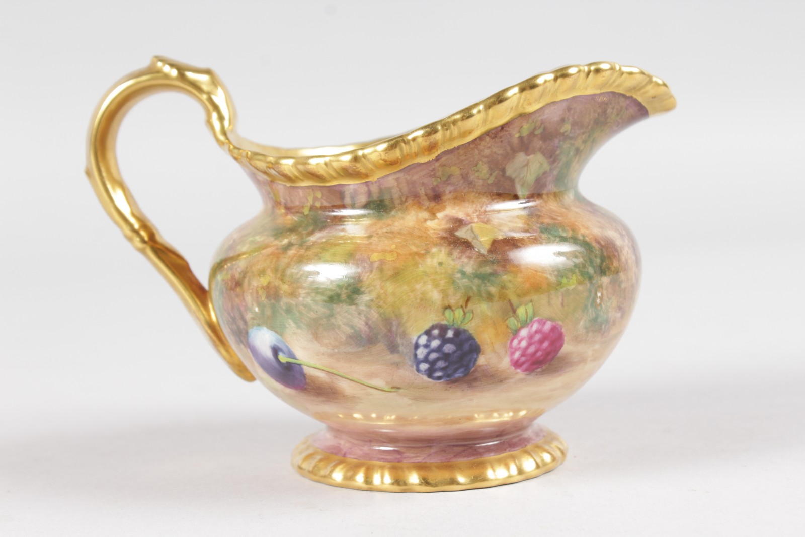 A ROYAL WORCESTER FRUIT PAINTED GADROON BORDERED CREAM JUG, signed by M. Tandy, black mark. - Image 5 of 6