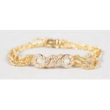 AN 18CT FOUR ROW YELLOW GOLD BRACELET, en suite to necklace.