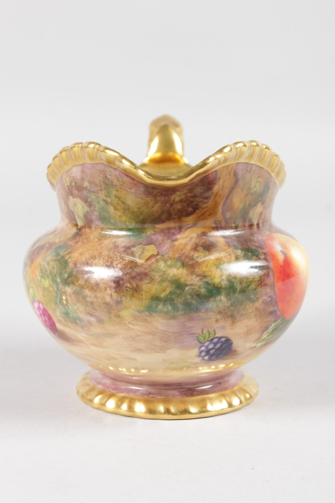 A ROYAL WORCESTER FRUIT PAINTED GADROON BORDERED CREAM JUG, signed by M. Tandy, black mark. - Image 6 of 6