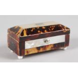 A MINIATURE TORTOISESHELL AND MOTHER-OF-PEARL CASKET on bun feet. 2.75ins long.