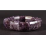 A GOOD AMETHYST FLEXIBLE BRACELET.