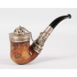 A COLOURED MEERSCHAUM PIPE with silver mounts and removable lid on a chain. 4.5ins long.