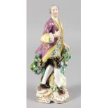 AN EARLY 19TH CENTURY FINE DERBY FIGURE OF A GALLANT standing beside a flowering plant in formal