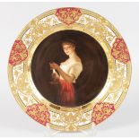 A SUPERB VIENNA PORTRAIT PLATE with rich gold border, the centre painted "GUTE NACHT" a young girl