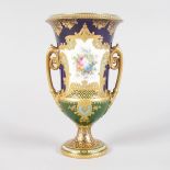 A SMALL ROYAL CROWN DERBY TWO HANDLED URN SHAPED VASE, rich blue and gilt ground, painted with a