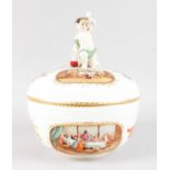 A GOOD BERLIN CIRCULAR PUNCH BOWL AND COVER, with cupid handle, two oval interior scenes and