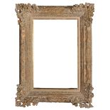 19th Century English School. A Swept Carved Giltwood Frame, 12.5" x 19.5".
