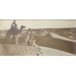 Lehnert & Landrock (20th Century) North African. Figures on Camels, in a Desert Scene, Photograph