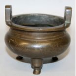 A 19TH/20TH CENTURY CHINESE SHISOU INLAID BRONZE TRIPOD CENSER, weighing 770gm, the sides with