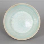 A CHINESE SONG STYLE QINGBAI PORCELAIN BOWL, with unglazed rim, the interior decorated beneath the