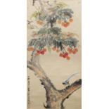 A CHINESE HANGING SCROLL PAINTING, decorated with calligraphy and with an exotic bird perched on a