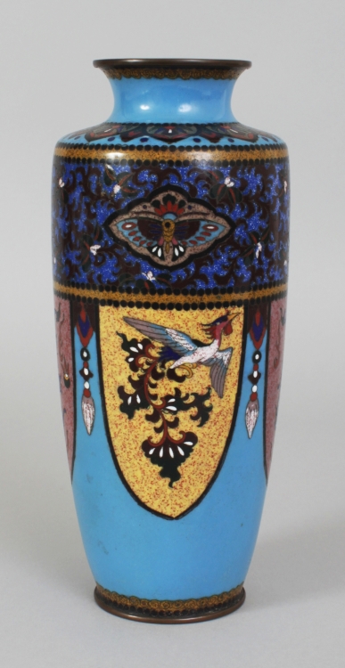 A JAPANESE MEIJI PERIOD BLUE GROUND CLOISONNE VASE, decorated with alternating dependent lappet